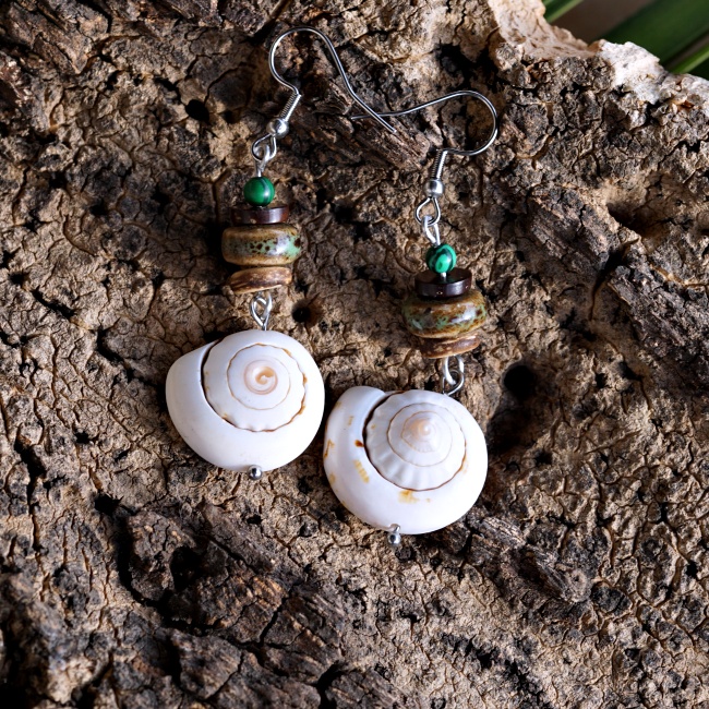 Pendientes de acero concha